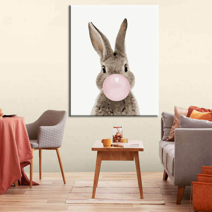 Painting by numbers art animal rabbit makes a bubble with chewing gum