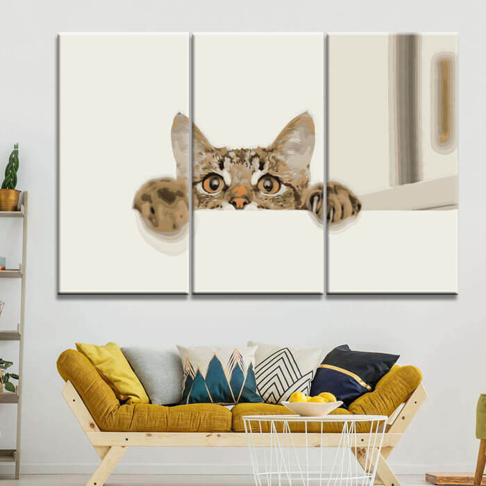 Painting by numbers art animal cat hangs with her paws on a wall and looks 3-piece